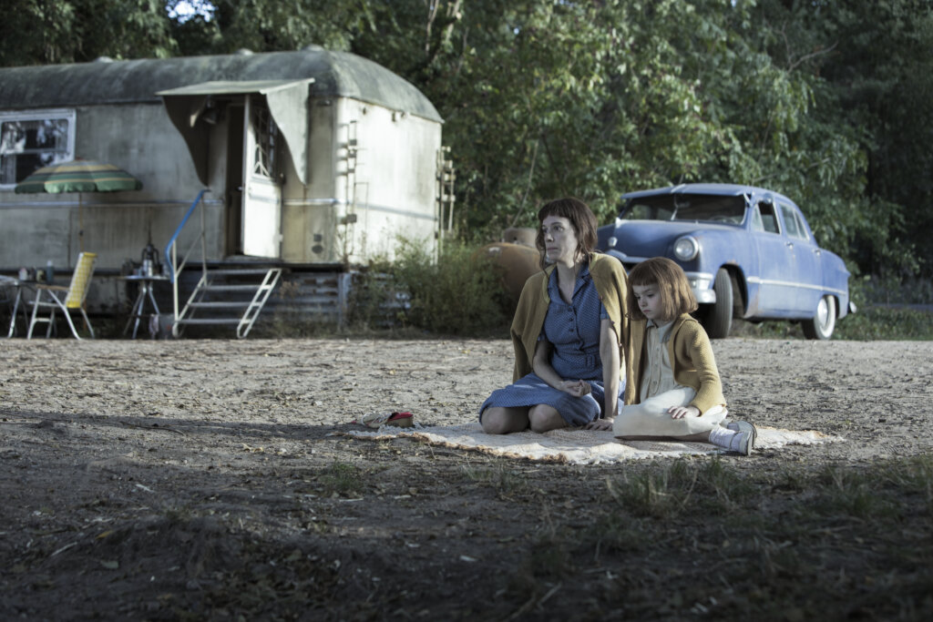 Beth and her mom outside mobile home